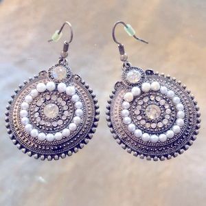Earrings, disk shaped, silver, pearls, and silver stones.